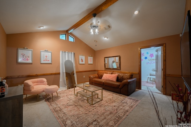 living room with lofted ceiling with beams, light carpet, and ceiling fan