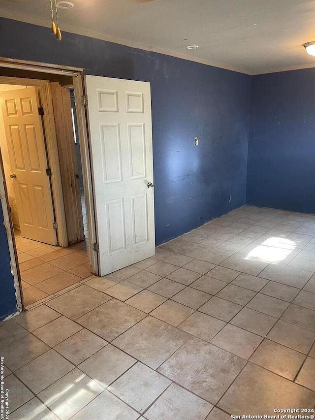 view of tiled spare room