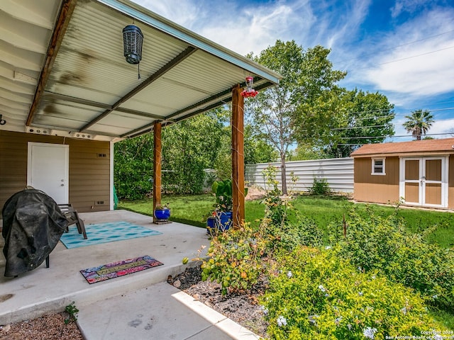 view of patio featuring a shed