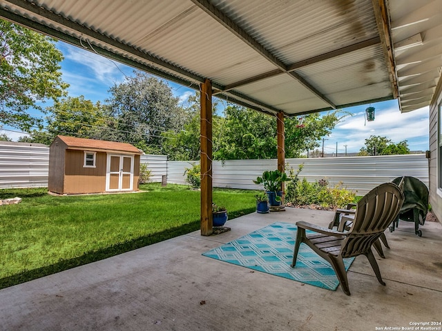 view of patio with a shed