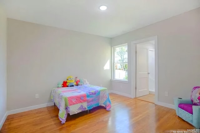 bedroom featuring hardwood / wood-style flooring