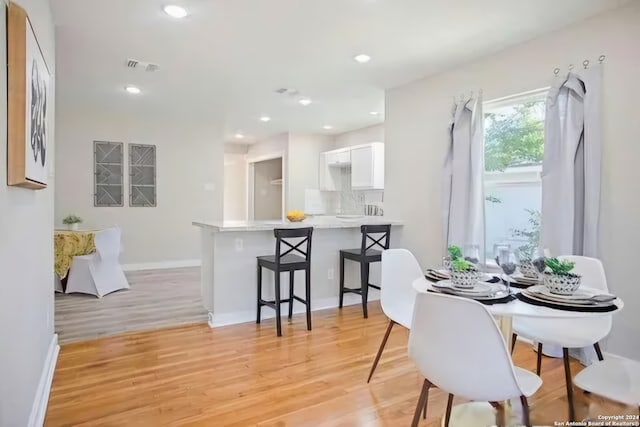 dining area featuring light hardwood / wood-style floors