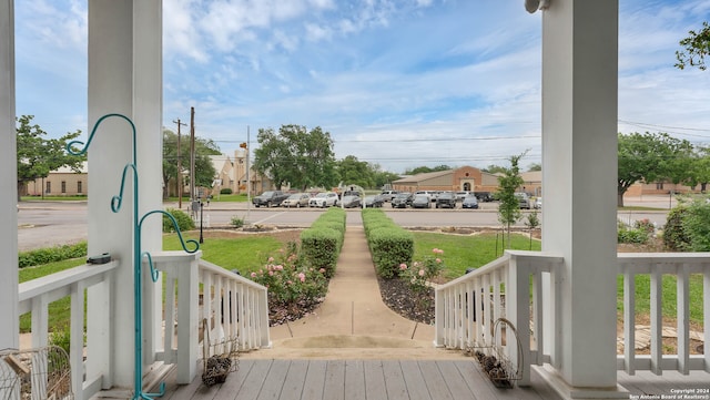 wooden deck featuring covered porch