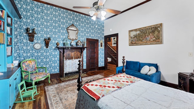 bedroom featuring ornamental molding, dark hardwood / wood-style floors, and ceiling fan