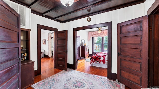 interior space with wood ceiling and light wood-type flooring