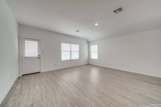 unfurnished room featuring light wood-type flooring