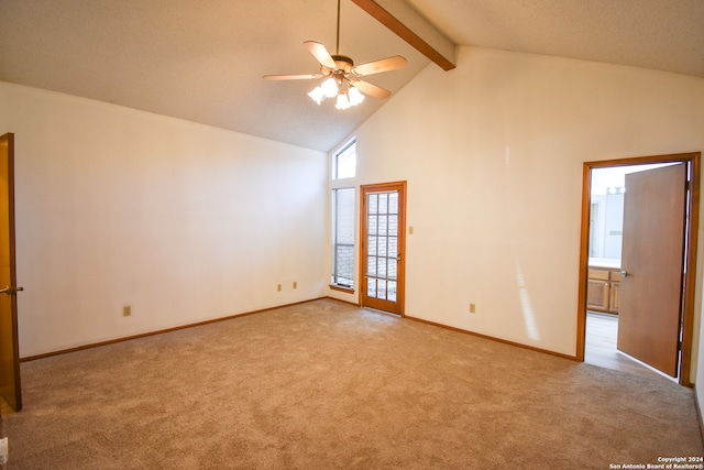 empty room with light colored carpet, beamed ceiling, and ceiling fan