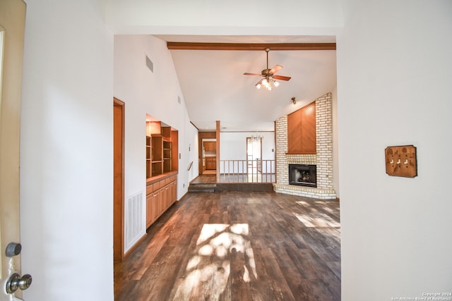 unfurnished living room featuring beam ceiling, dark hardwood / wood-style flooring, a fireplace, high vaulted ceiling, and ceiling fan