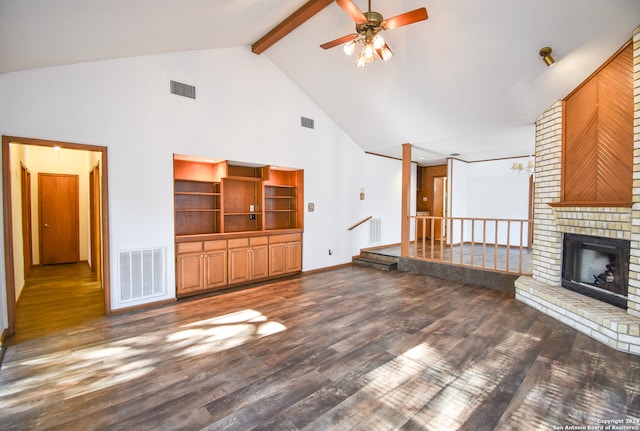 unfurnished living room with dark hardwood / wood-style floors, beam ceiling, a brick fireplace, high vaulted ceiling, and ceiling fan