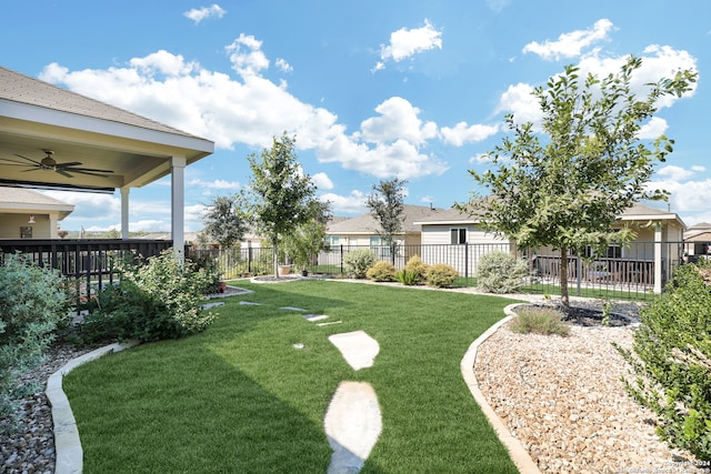 view of yard featuring ceiling fan