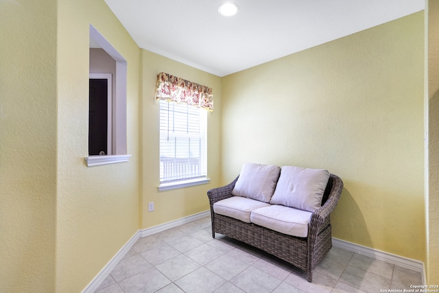 living area with light tile patterned floors