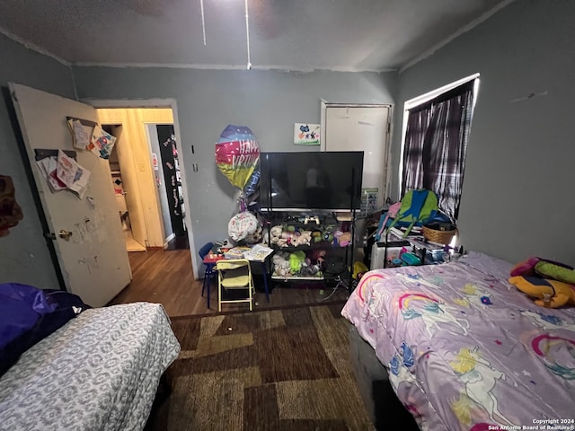 bedroom featuring hardwood / wood-style flooring