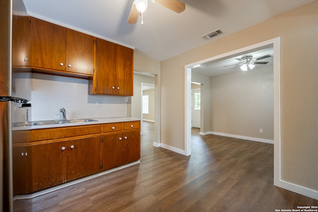 kitchen with sink, dark wood-type flooring, and ceiling fan