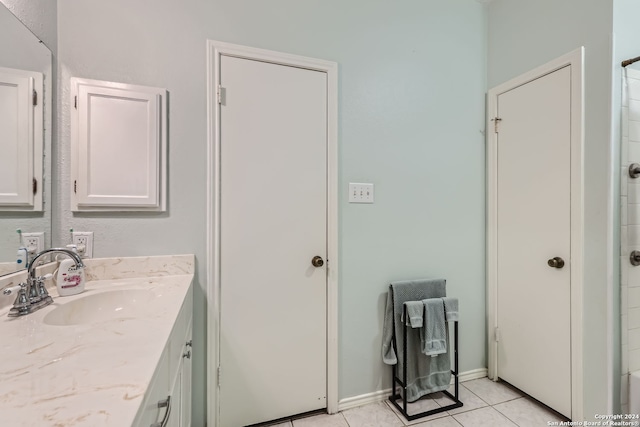 bathroom with vanity and tile patterned floors