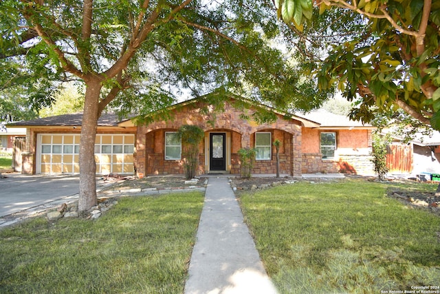 ranch-style house with a front yard