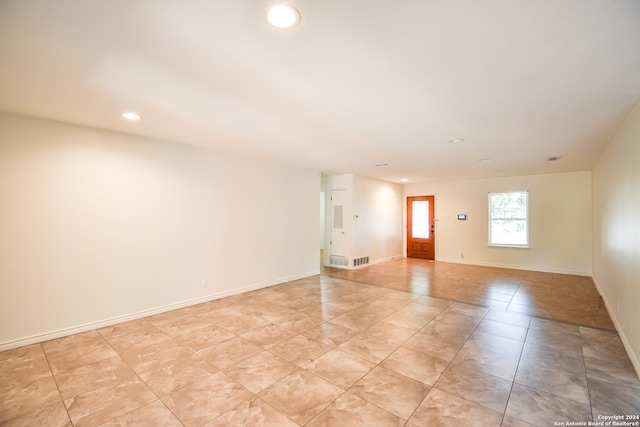 view of tiled spare room