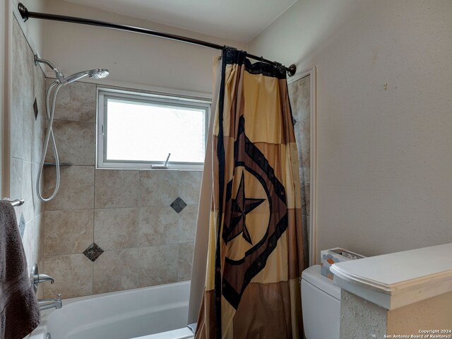 414 E Hathaway Dr, San Antonio, TX 78209 - full bath with shower / tub combo with curtain and toilet