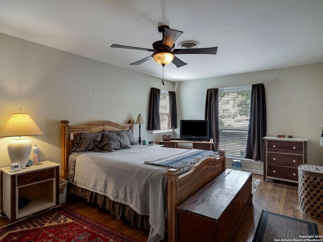 414 E Hathaway Dr, San Antonio, TX 78209 - bedroom with ceiling fan and wood finished floors