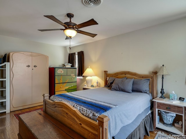 414 E Hathaway Dr, San Antonio, TX 78209 - bedroom featuring ceiling fan, wood finished floors, and visible vents