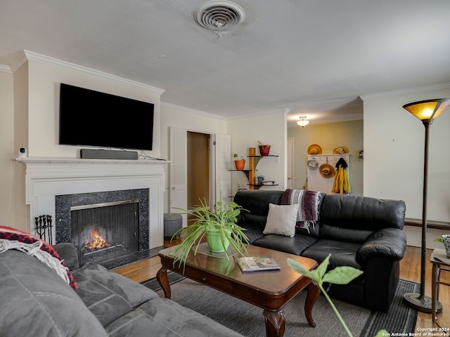414 E Hathaway Dr, San Antonio, TX 78209 - living room featuring visible vents, crown molding, and wood finished floors