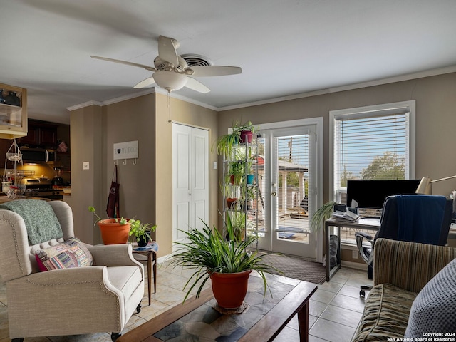 living room with ceiling fan, ornamental molding, and light tile patterned flooring