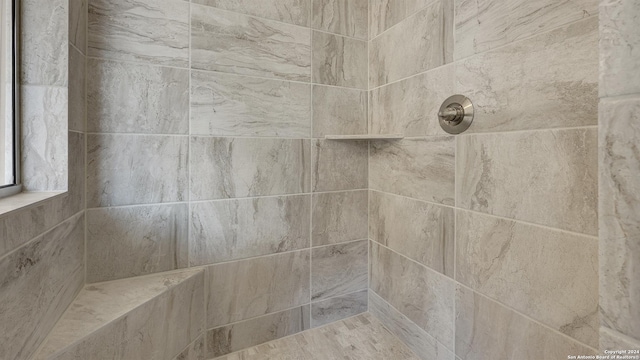 details featuring tiled shower