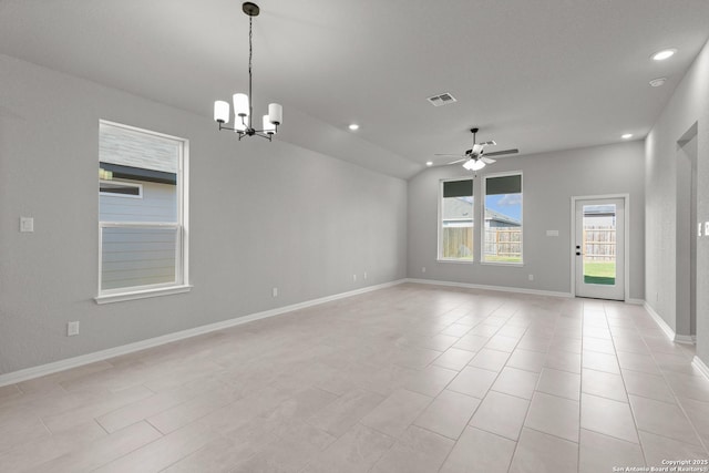 spare room featuring ceiling fan with notable chandelier, recessed lighting, baseboards, lofted ceiling, and visible vents