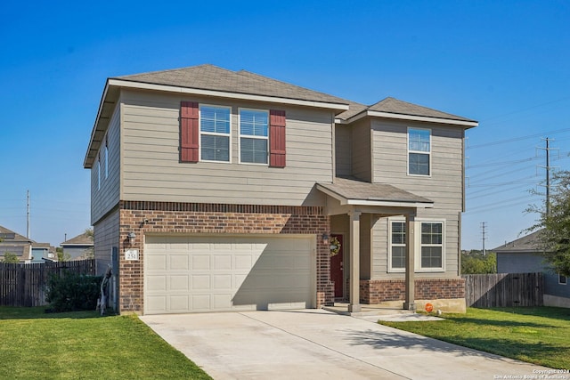 view of front facade featuring a front yard and a garage