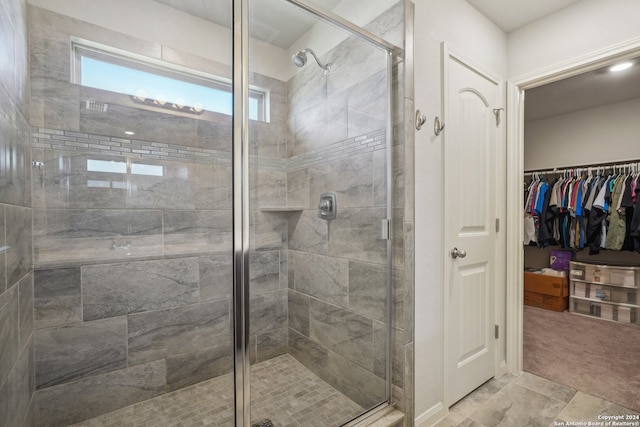 bathroom featuring an enclosed shower