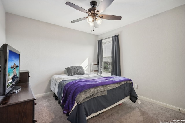 bedroom with ceiling fan and carpet flooring