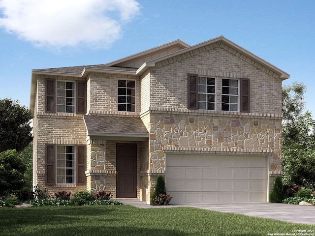 view of property with a front yard and a garage