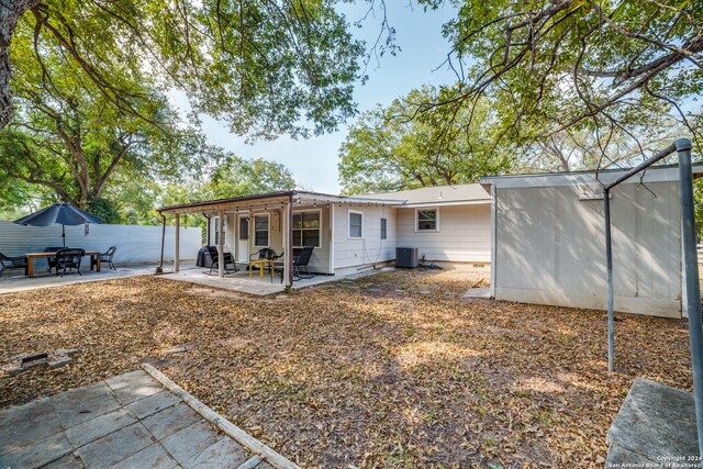 back of house featuring a patio area and central AC unit