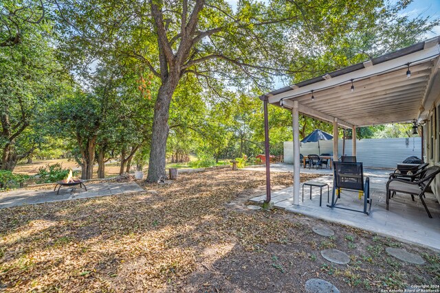 view of yard with a patio area