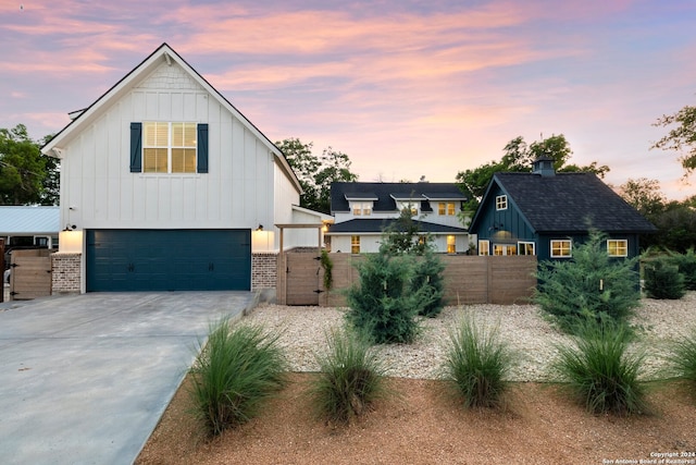 view of front of home with a garage