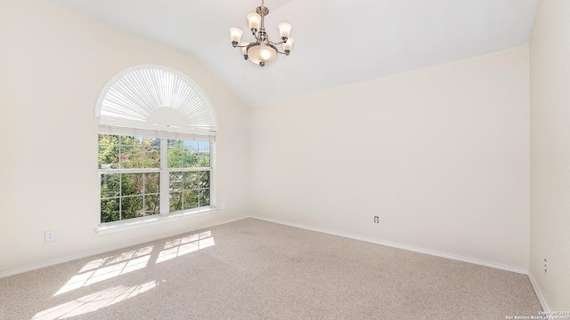 1042 Segovia, New Braunfels, TX 78130 - carpeted spare room featuring a notable chandelier, vaulted ceiling, and baseboards