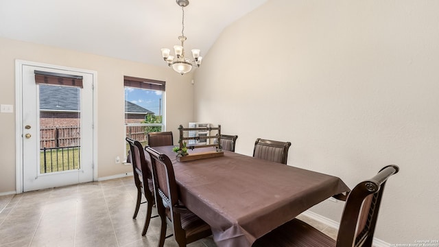 1042 Segovia, New Braunfels, TX 78130 - dining space with lofted ceiling, a chandelier, and baseboards