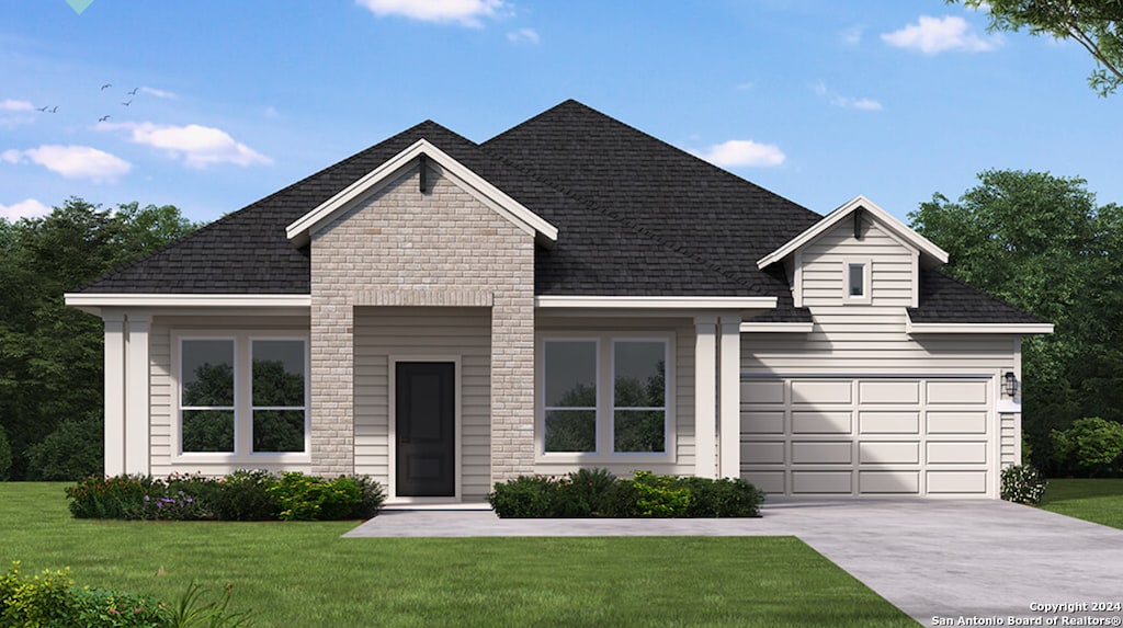 view of front facade featuring a front lawn and a garage