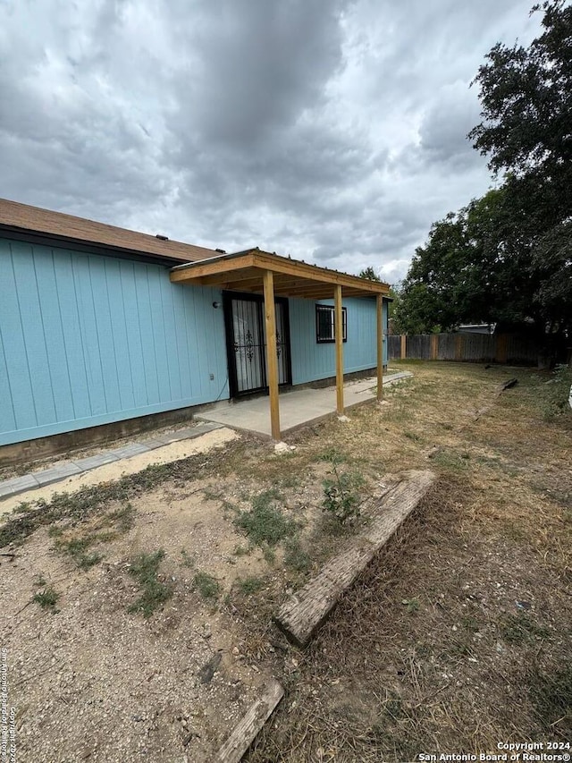 rear view of house with a patio area