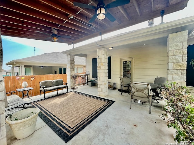 view of patio / terrace featuring ceiling fan