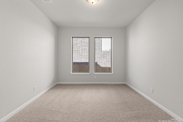 view of carpeted spare room