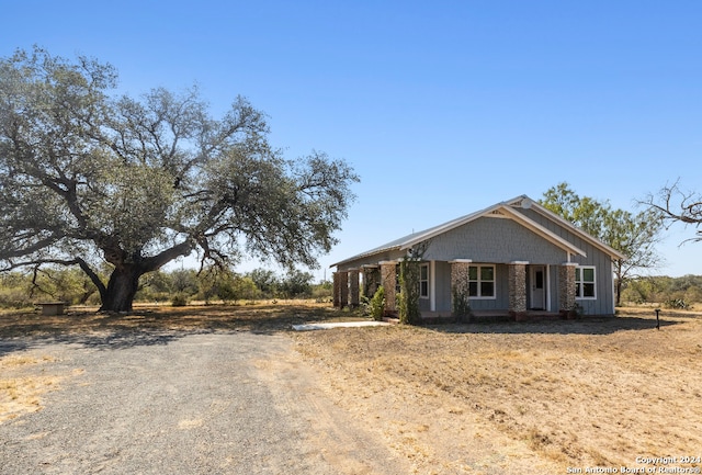 craftsman inspired home featuring covered porch