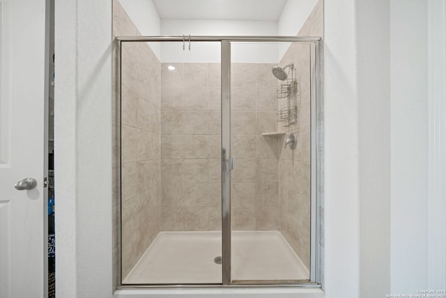 bathroom featuring walk in shower