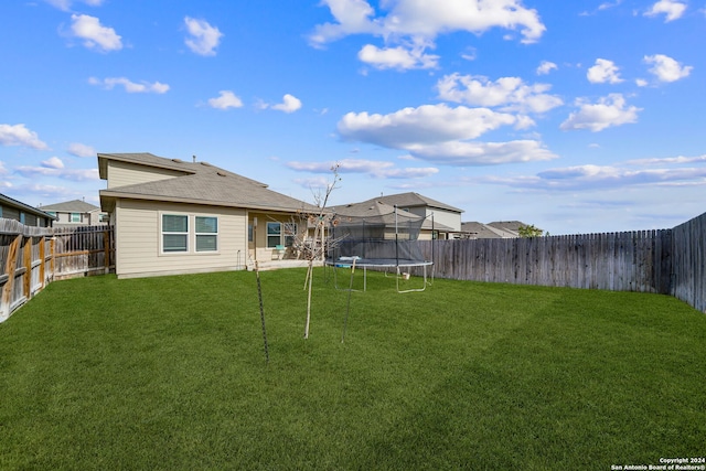 view of yard featuring a trampoline