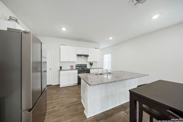 kitchen featuring an island with sink, black range with gas cooktop, white cabinets, stainless steel refrigerator, and dark hardwood / wood-style flooring