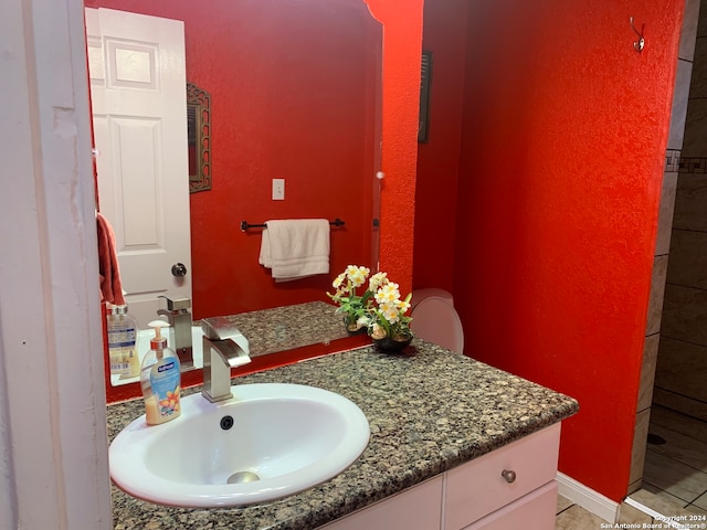 bathroom with vanity and tile patterned flooring