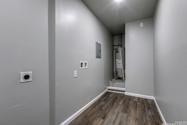 washroom with hookup for a washing machine, dark hardwood / wood-style flooring, water heater, electric dryer hookup, and electric panel