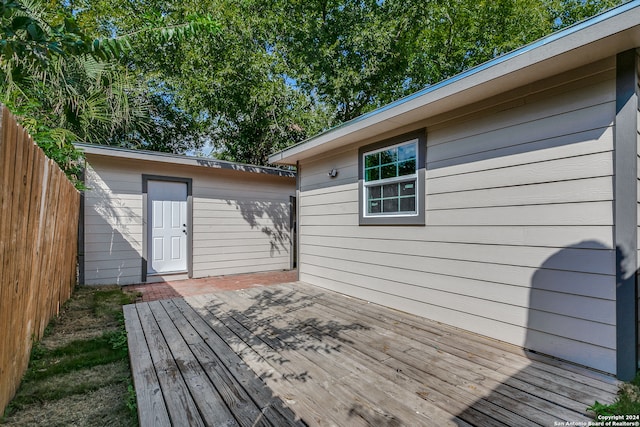 deck with an outdoor structure