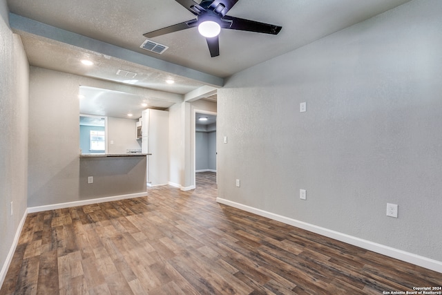 unfurnished room featuring hardwood / wood-style flooring and ceiling fan