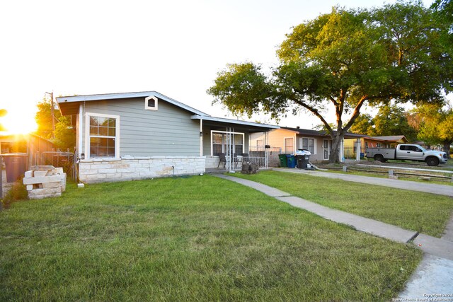 ranch-style house with a front yard