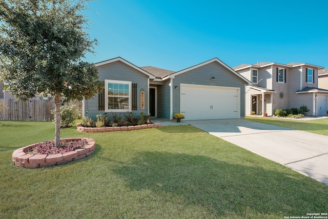 view of front of house with a front lawn and a garage